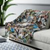 Custom photo collage blanket on couch Custom photo collage blanket displayed on couch in cozy room setting with green plant.
