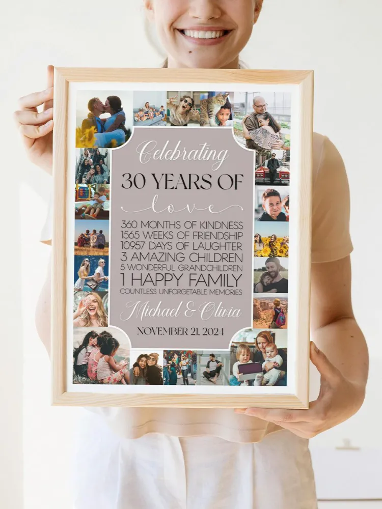 Personalized anniversary sign in wooden frame with custom names, date, and text, enclosed by photo collage, held up by a young smiling woman - ideal custom gift for couples.