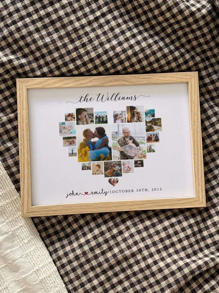 Personalized family anniversary sign in wooden frame with custom names, date, text, and and heart-shaped photo collage, displayed on textile background.